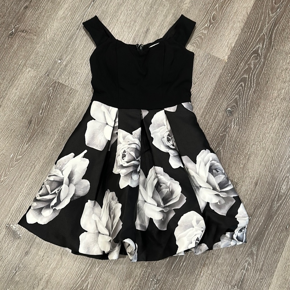 Xtraordinary brand dress. Like new condition. Worn once for cotillion.